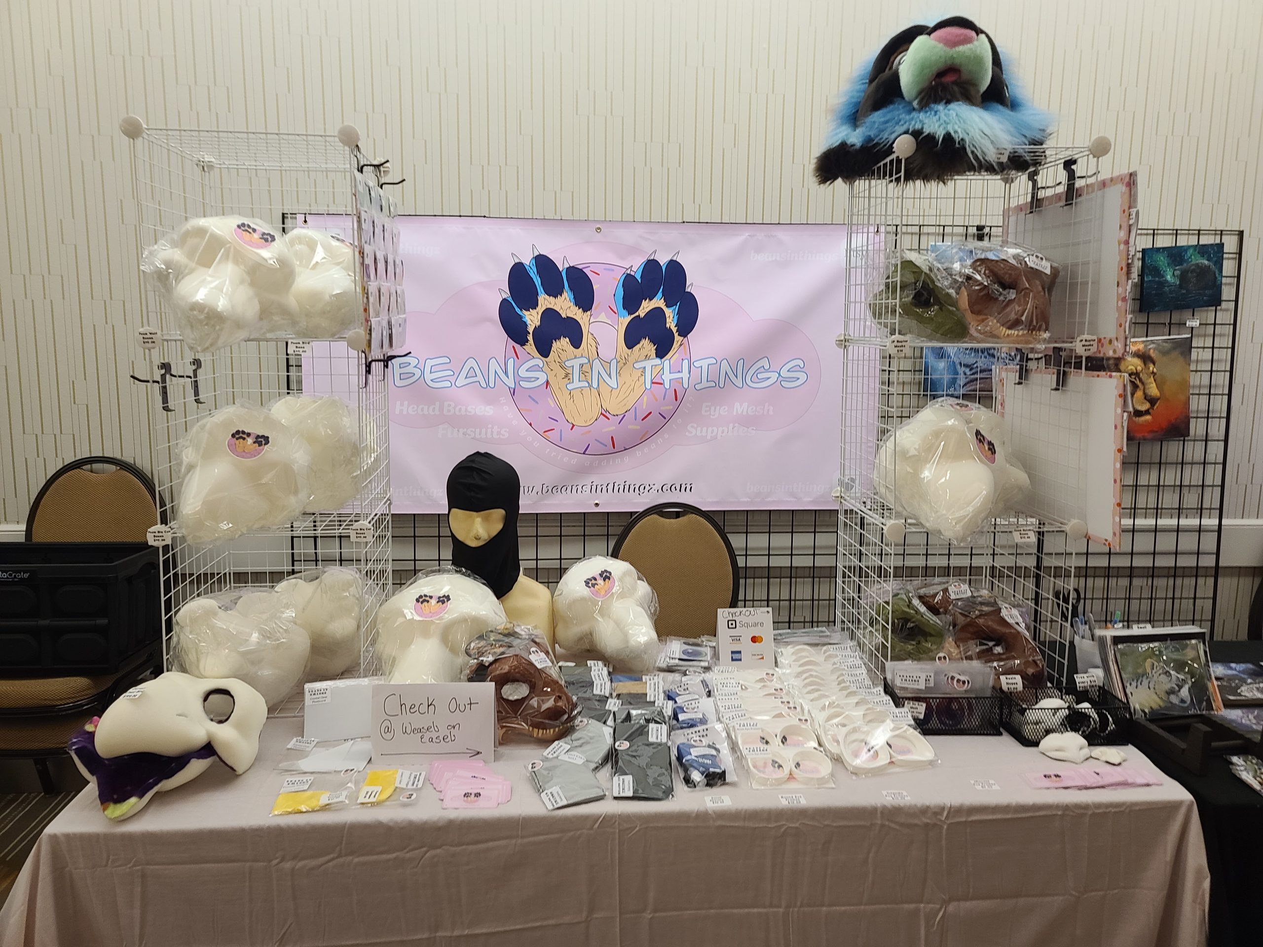 A solo convention table at furlandia 2022