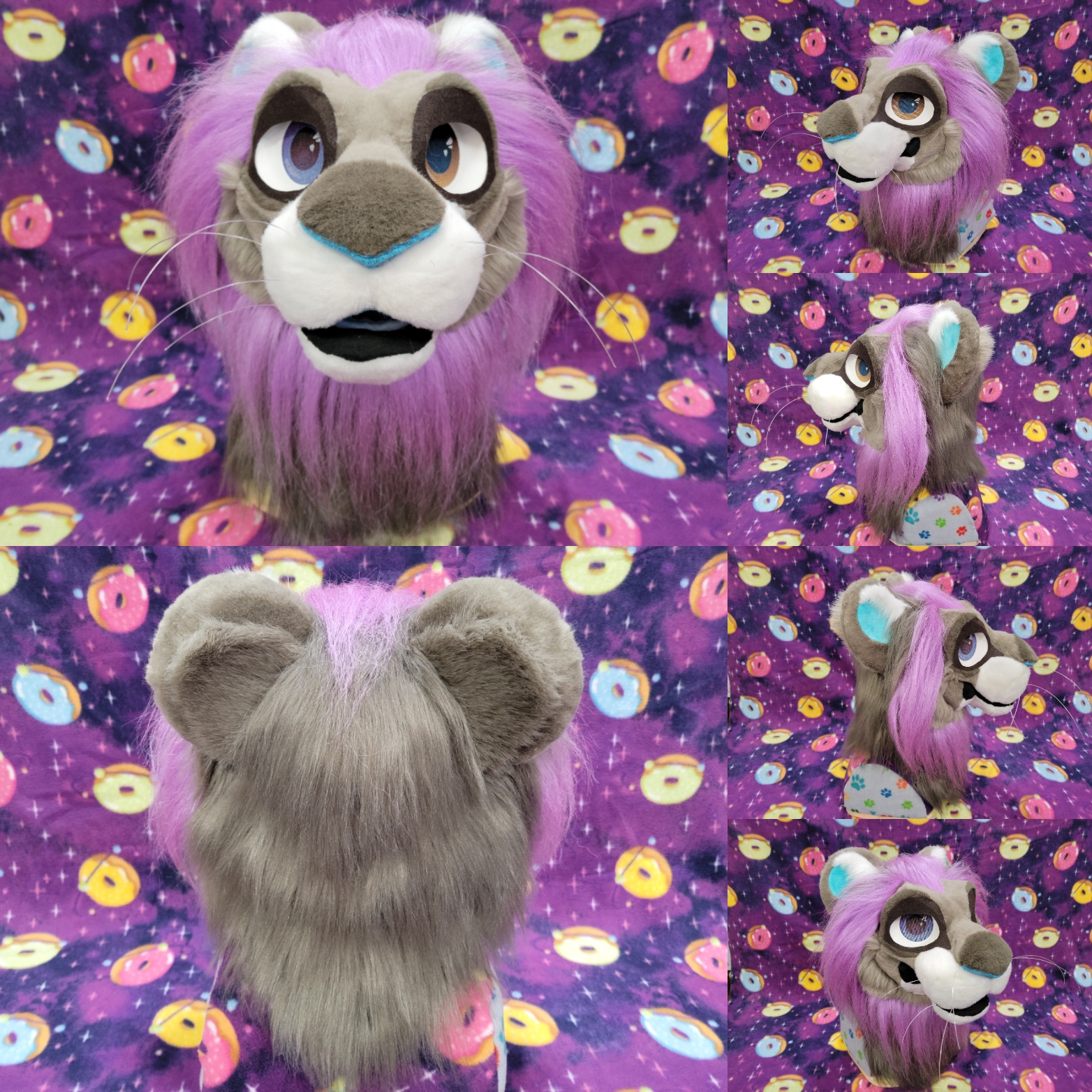A grey, violet and white cartoon lion head is depicted with purple and brown eyes and white eye frames. They have a purple tongue and are made on our big cat bases.